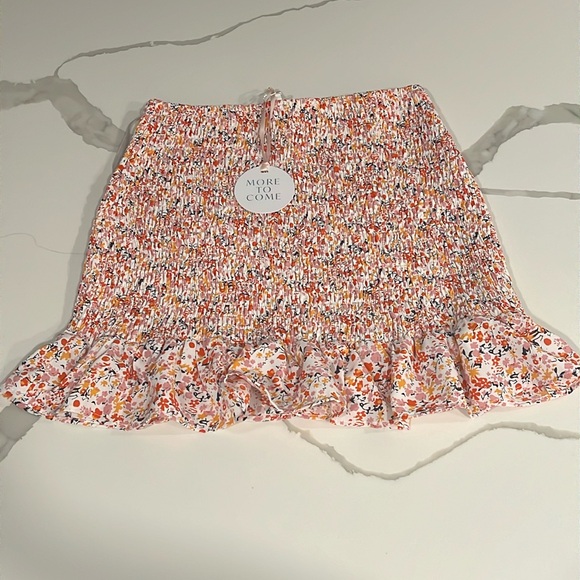 NWT REVOLVE MORE TO COME Zhuri Smocked Mini Skirt in Pink Floral - Picture 2 of 8